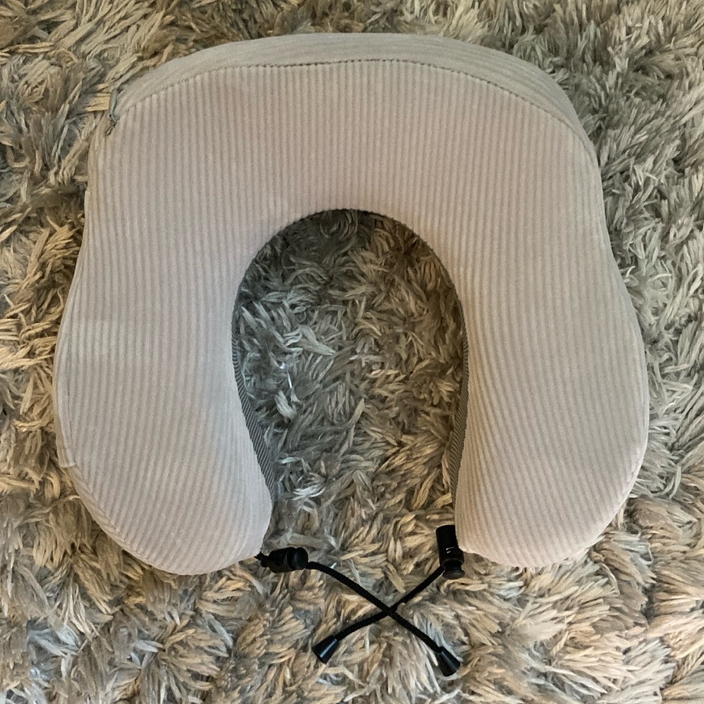 Gray neck travel pillow